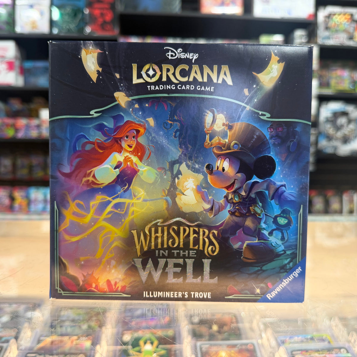 Stock image of Whispers in the Well Lorcana Illumineer's Trove. May not accurately reflect the condition of the actual product.